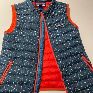 Patagonia Navy Floral Puffer Vest with Red Accents